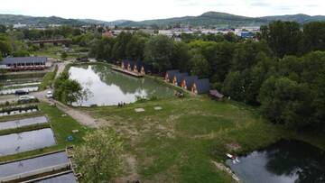 Фото номера Улучшенный номер с кроватью размера «king-size» Кемпинги Pastravaria Zavoi г. Valea Danului 12
